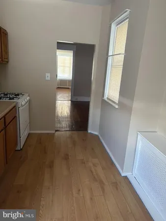 a white refrigerator freezer sitting in a kitchen