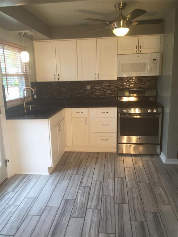708 Walnut Street Monongahela, PA 15063 - Photo 10 of 22 Beautiful floor, large sink and great cabinets!