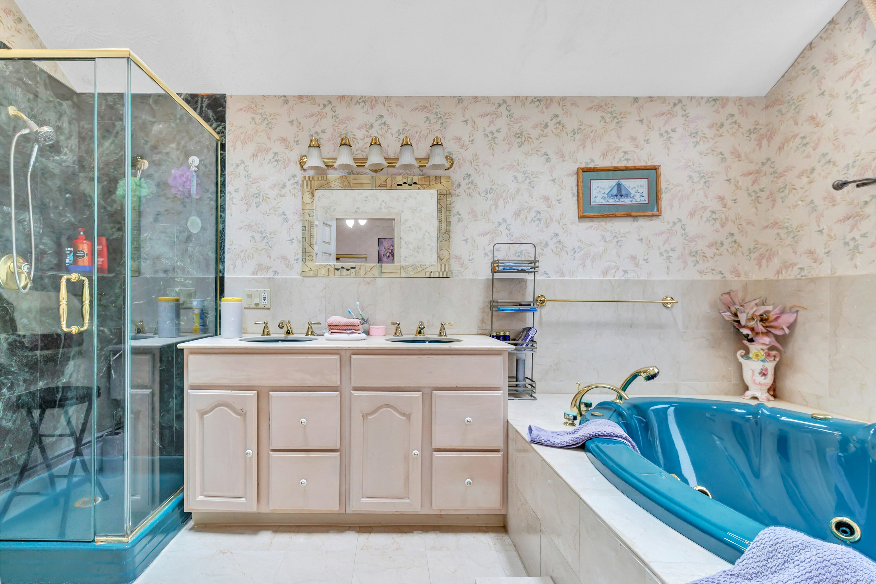40 Walnut Street Monroe, CT 06468 - Photo 21 of 40 a spacious bathroom with a sink a mirror and a bathtub