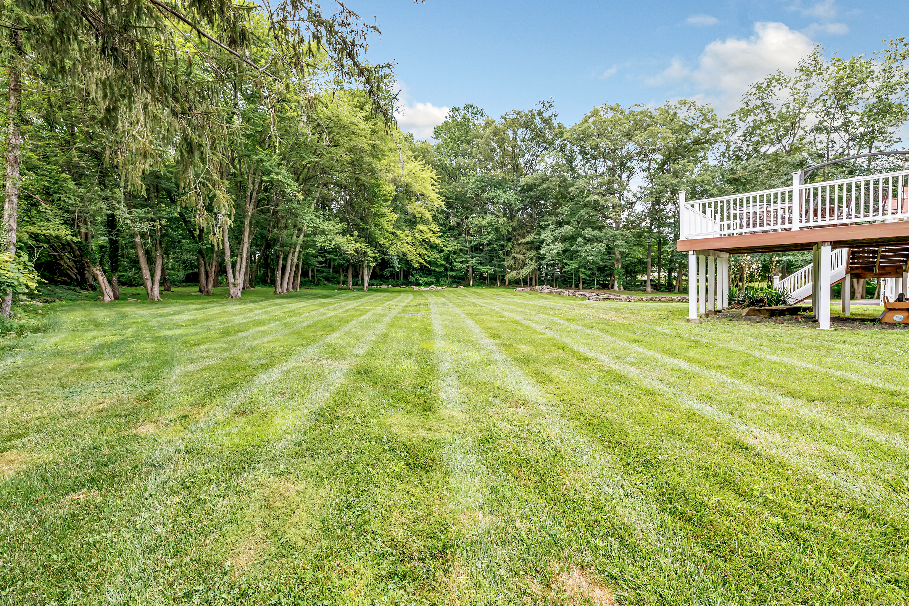 40 Walnut Street Monroe, CT 06468 - Photo 3 of 40 a view of a house with a big yard and large trees