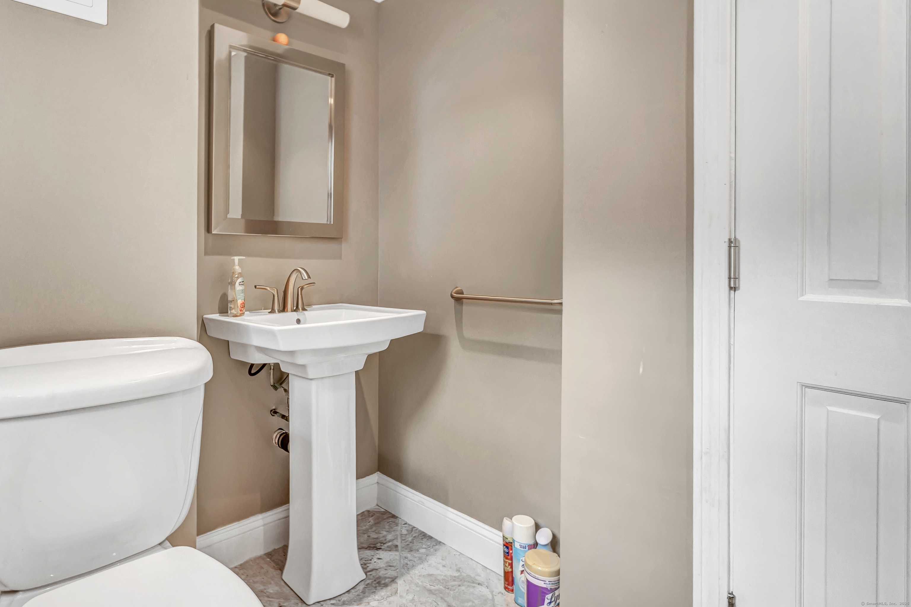 40 Walnut Street Monroe, CT 06468 - Photo 31 of 40 a bathroom with a sink toilet and a mirror