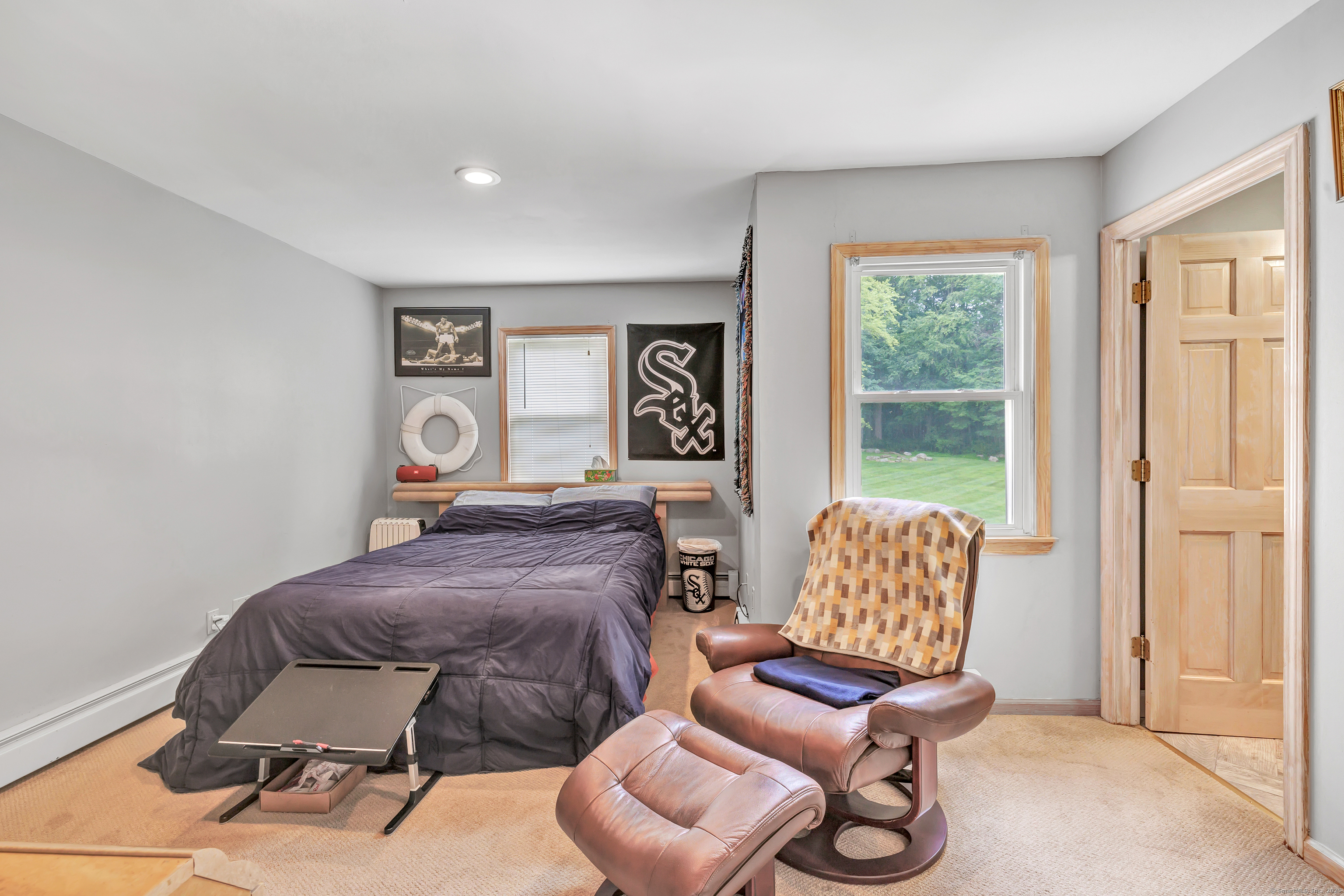 40 Walnut Street Monroe, CT 06468 - Photo 8 of 40 a bedroom with a bed and wooden floor