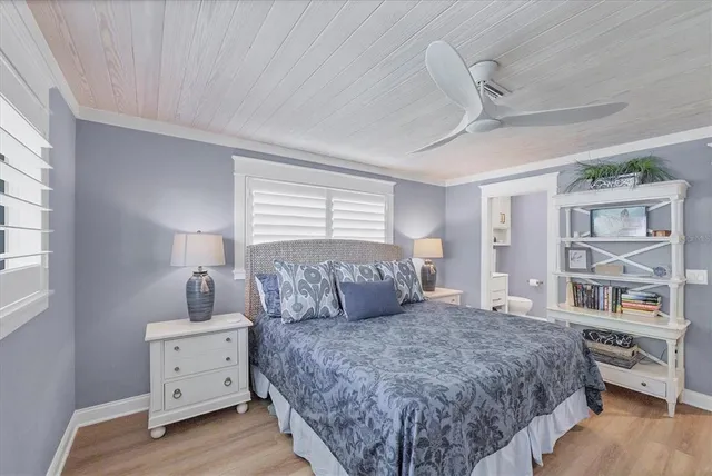 a bathroom with a sink mirror vanity and toilet