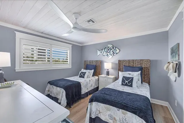 a bathroom with a toilet a sink and a mirror