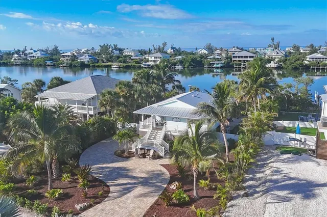 a view of a lake with a yard