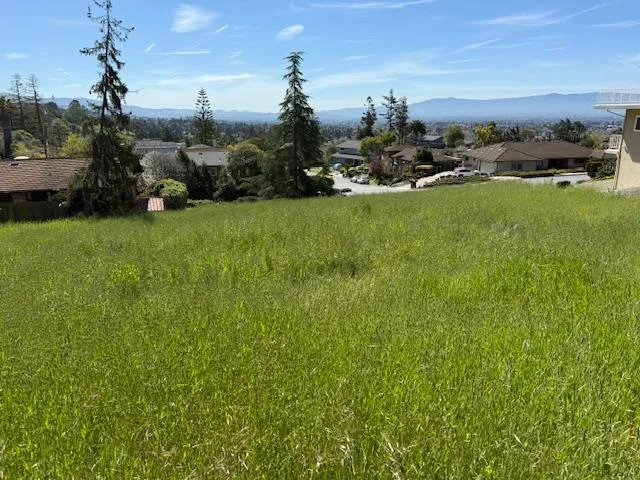 a view of a town with barn house