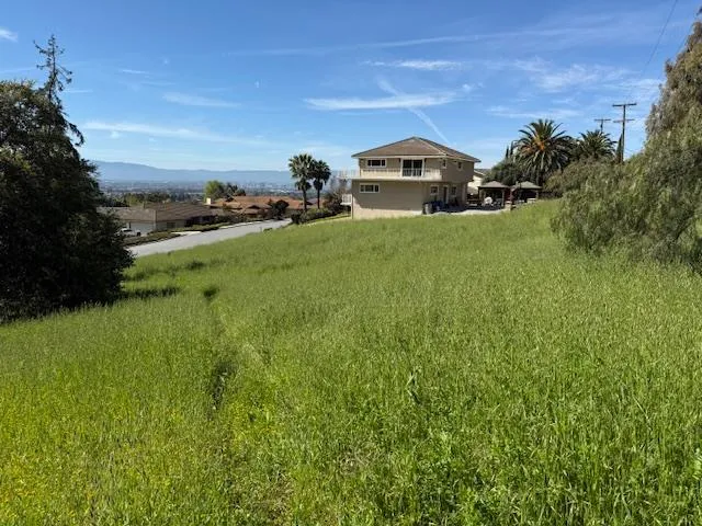 a view of a house with a big yard