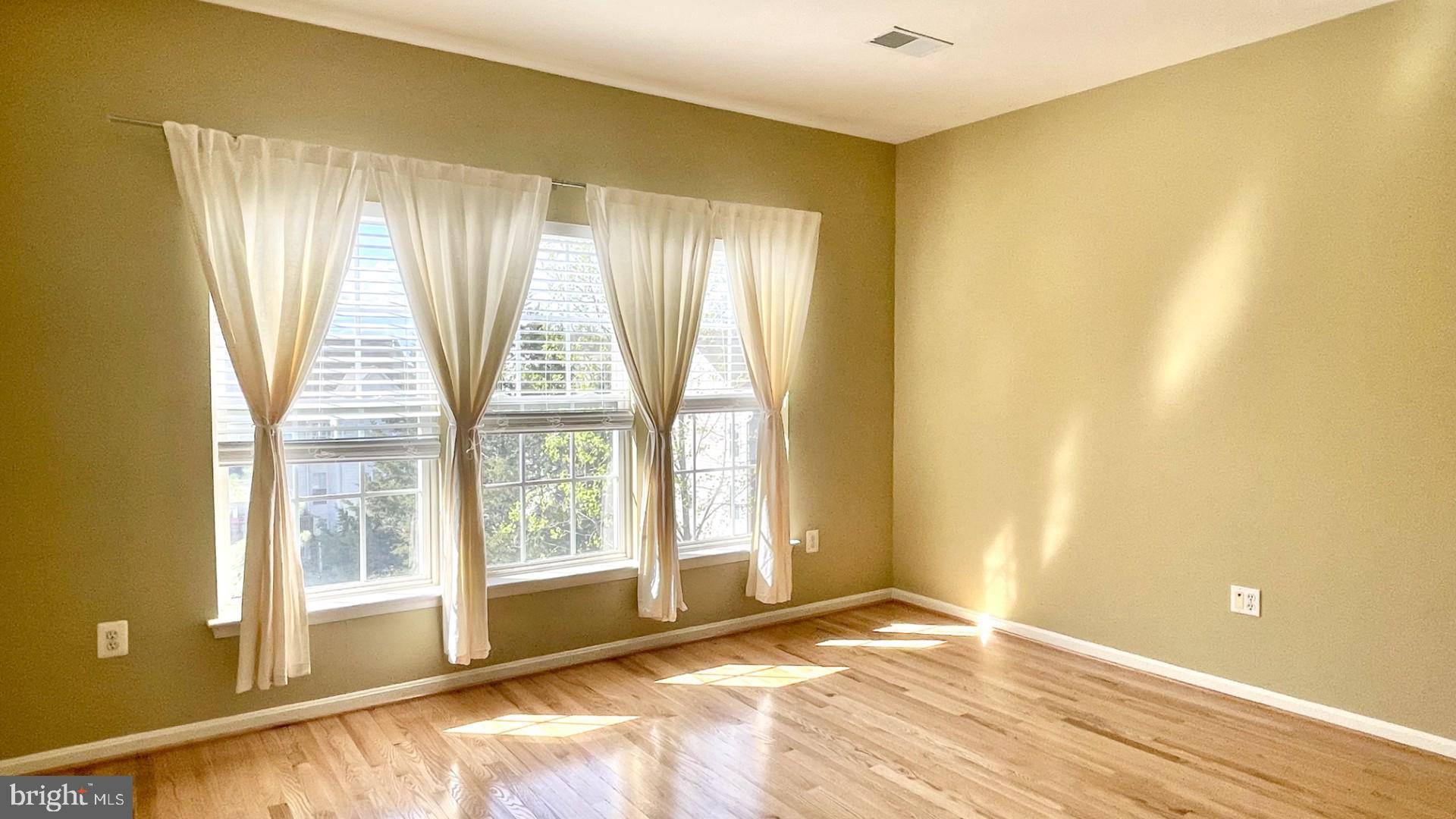 6002 St Hubert Lane Centreville, VA 20121 - Photo 20 of 27 a view of an empty room with a window
