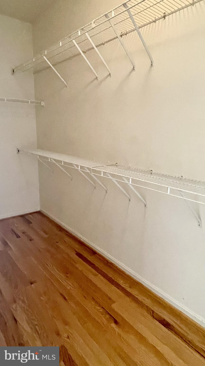 6002 St Hubert Lane Centreville, VA 20121 - Photo 21 of 27 a view of a room with racks on the wall