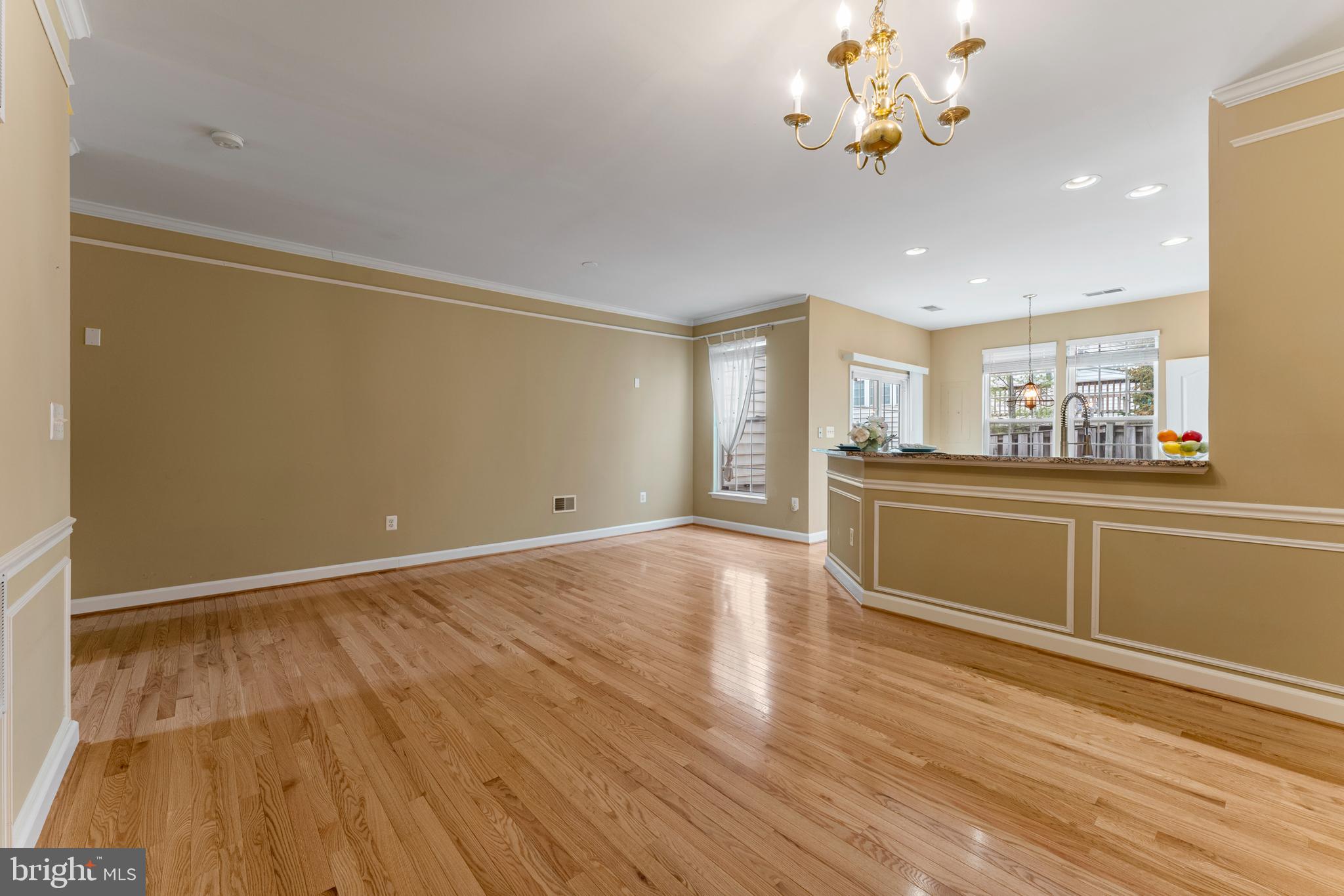 6002 St Hubert Lane Centreville, VA 20121 - Photo 4 of 27 a view of a kitchen with a dishwasher cabinets and wooden floor