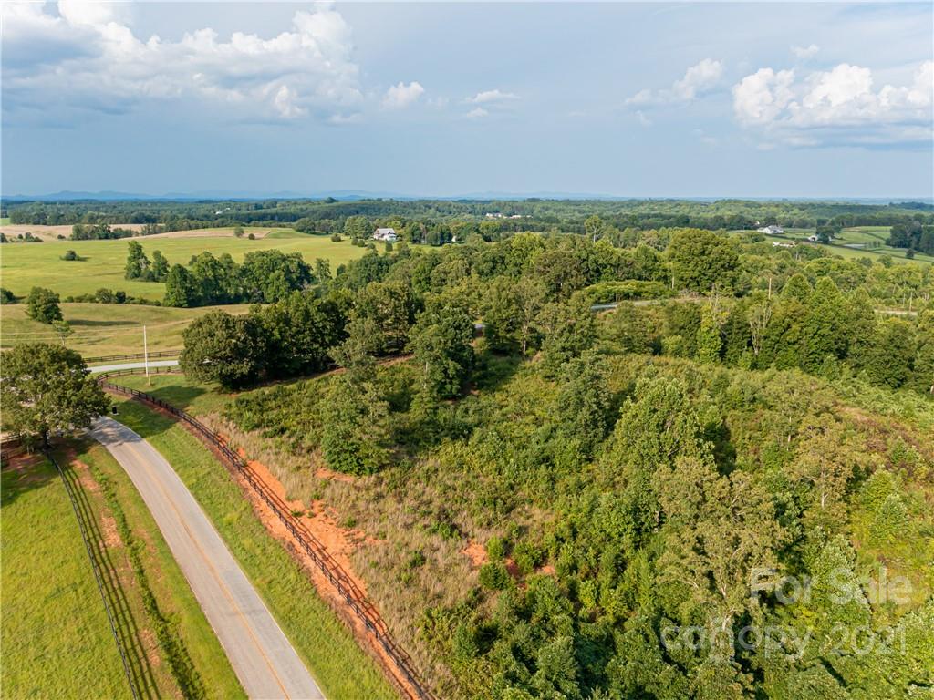 32 Toney Road, Unit 1 Mill Spring, NC 28756 - Photo 1 of 6 a view of an ocean from a balcony