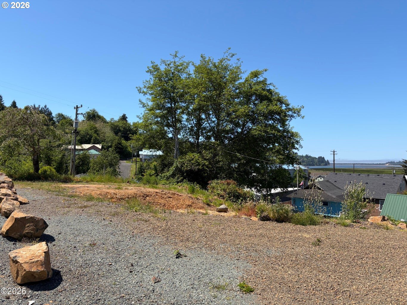 95 Gregory Street Wheeler, OR 97147 - Photo 10 of 20 a backyard of a house with lots of green space