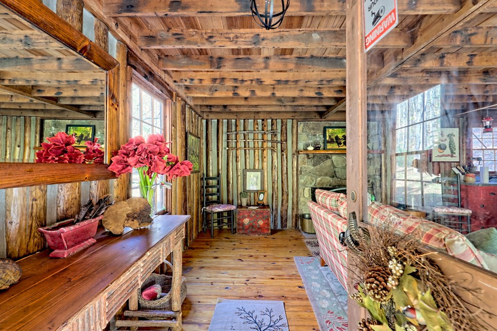 1307 Clear Creek Road Hayesville, NC 28904 - Photo 14 of 65 a outdoor space with lots of furniture and plants