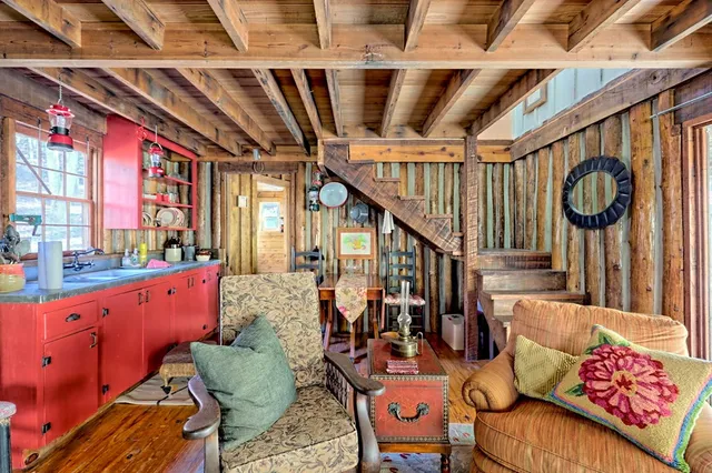 a view of an entryway with wooden floor