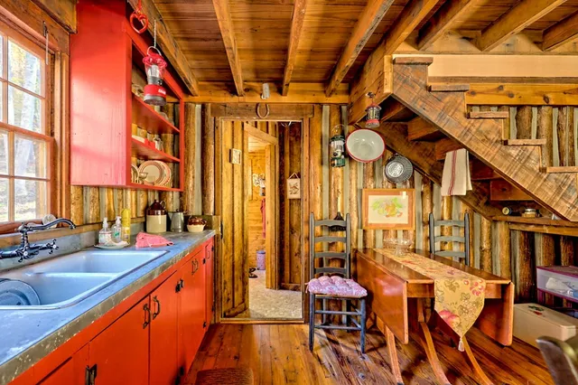 a view of room with wooden floor