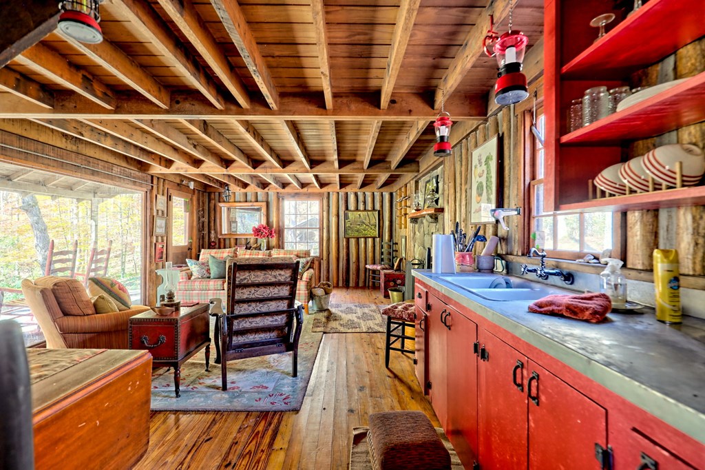 1307 Clear Creek Road Hayesville, NC 28904 - Photo 28 of 65 a view of a chairs and table in a patio