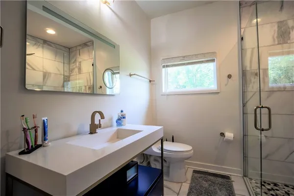 a bed room with bed furniture and a window