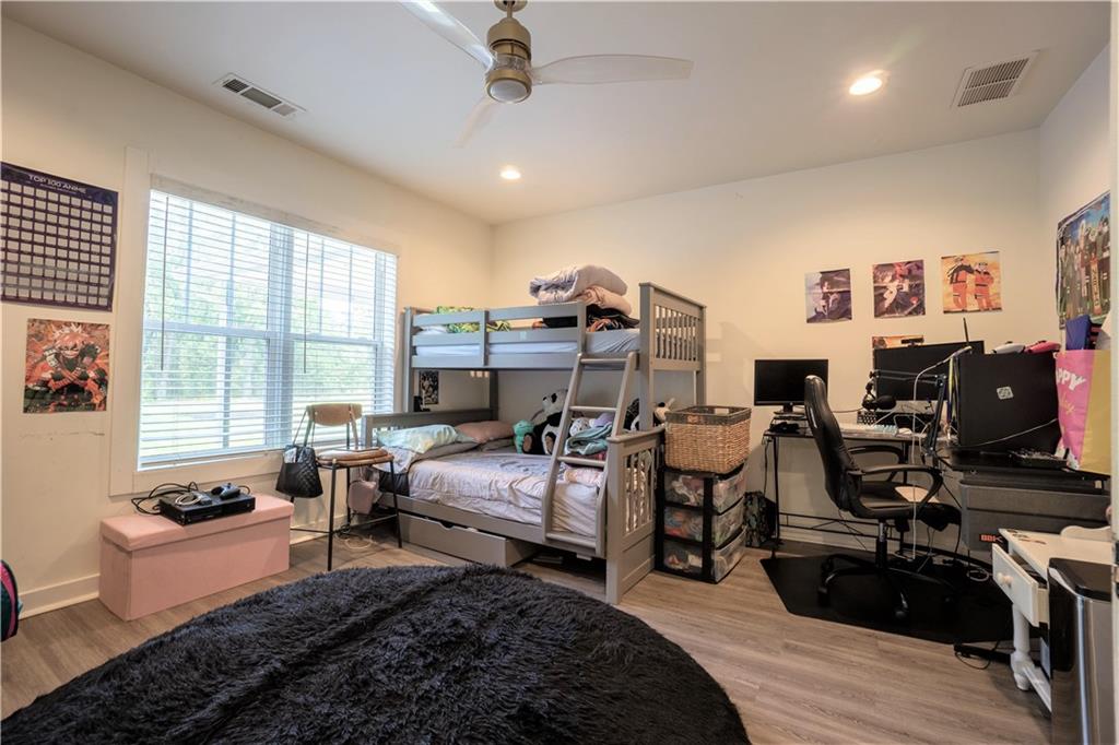 811 King Road Stone Mountain, GA 30088 - Photo 13 of 19 a bed room with bed furniture and a window