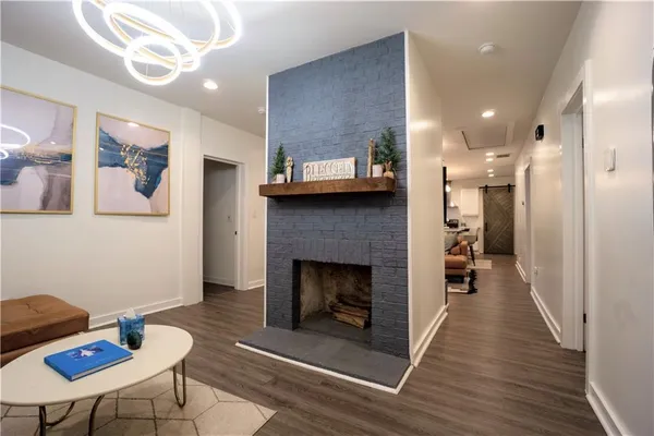 a kitchen with a stove a sink and a refrigerator