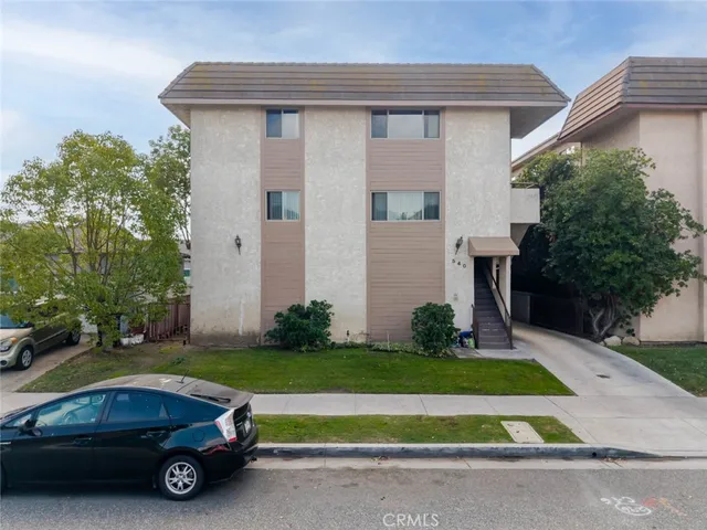 a car parked in front of a house