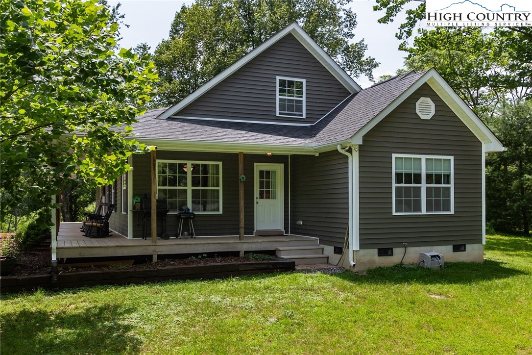 351 Colony Lane Purlear, NC 28665 - Photo 7 of 39 a view of a house with a yard