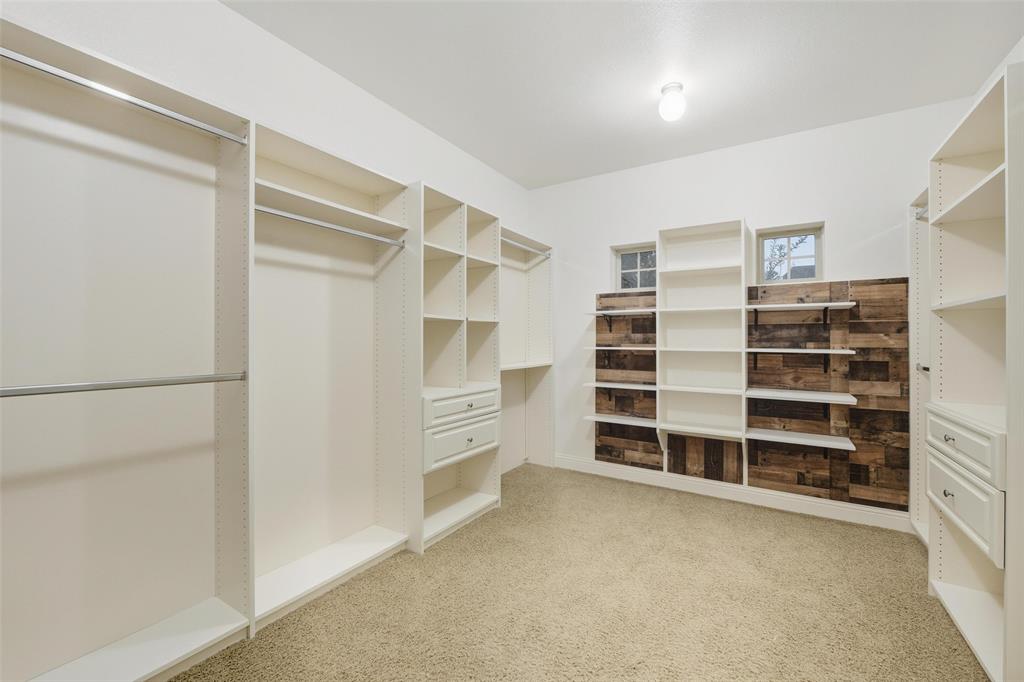 1321 Talley Lane Frisco, TX 75033 - Photo 19 of 40 Spacious closet featuring light colored carpet