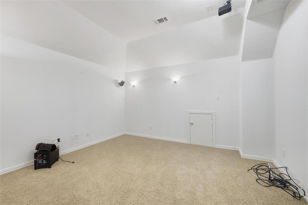 1321 Talley Lane Frisco, TX 75033 - Photo 32 of 40 Bonus room with carpet floors and lofted ceiling