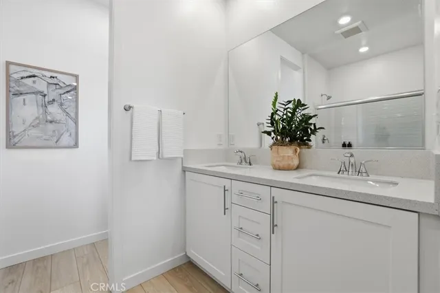 a bathroom with a shower and toilet