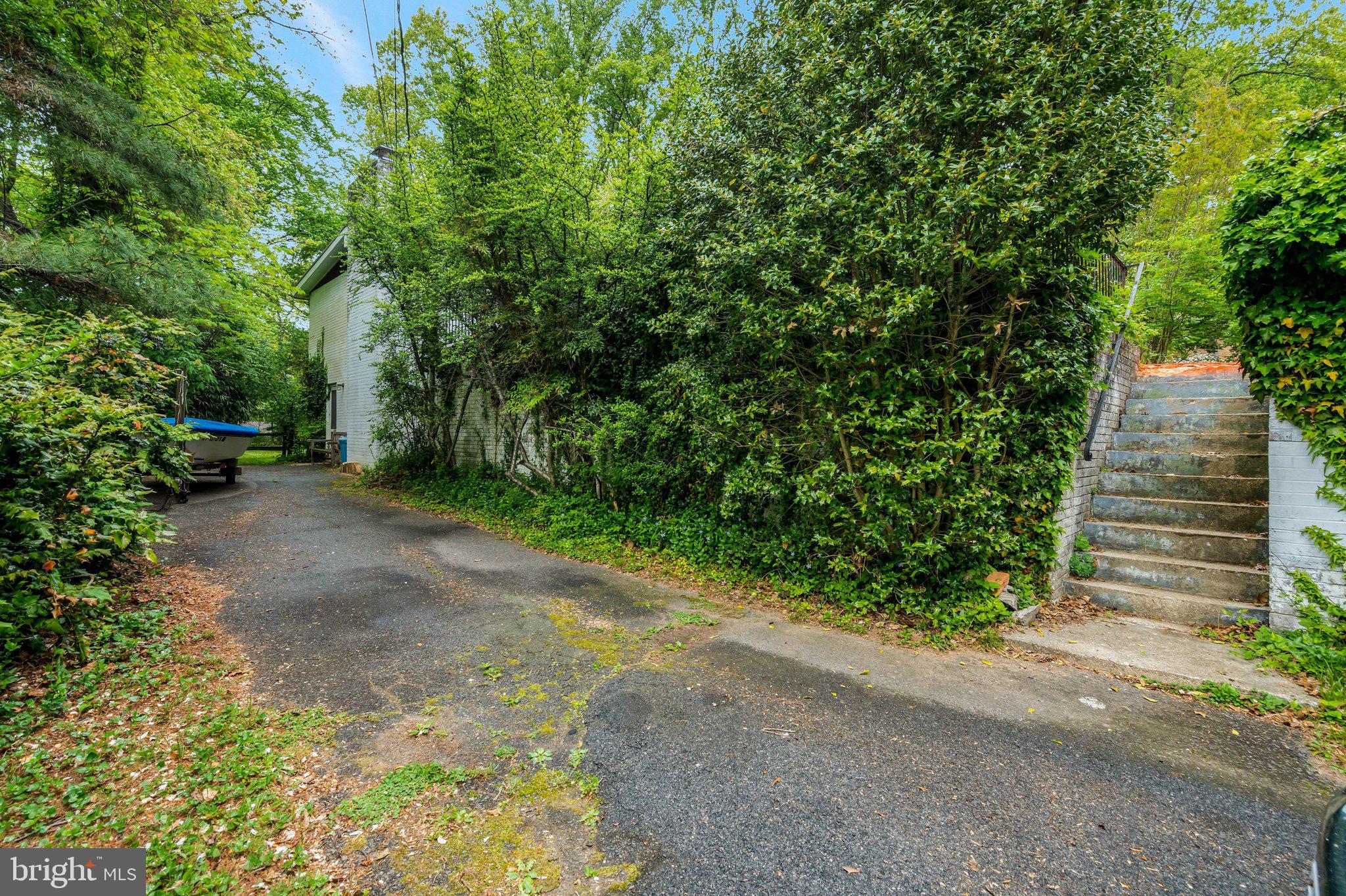 9932 Fairoaks Road Vienna, VA 22181 - Photo 6 of 9 Driveway with stairs leading to House