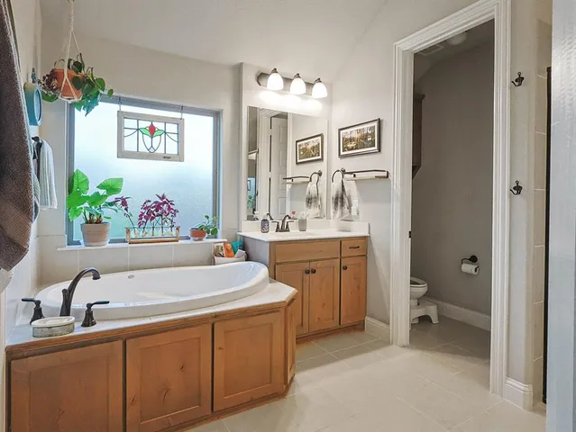 a picture of a room with a white wall and a picture of it