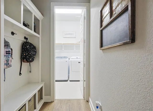 a bathroom with a shower and a sink