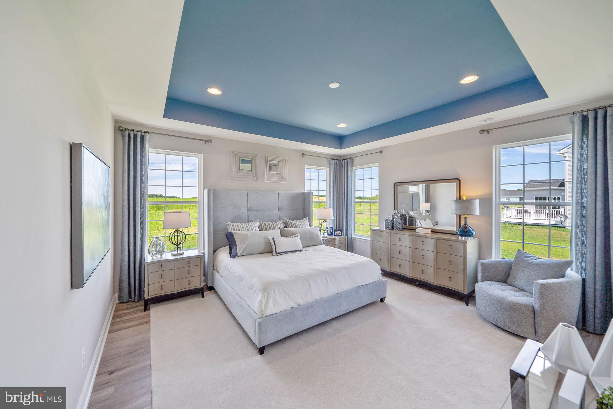 5540 Waterloo Road Columbia, MD 21045 - Photo 7 of 11 a bedroom with a bed and a couch