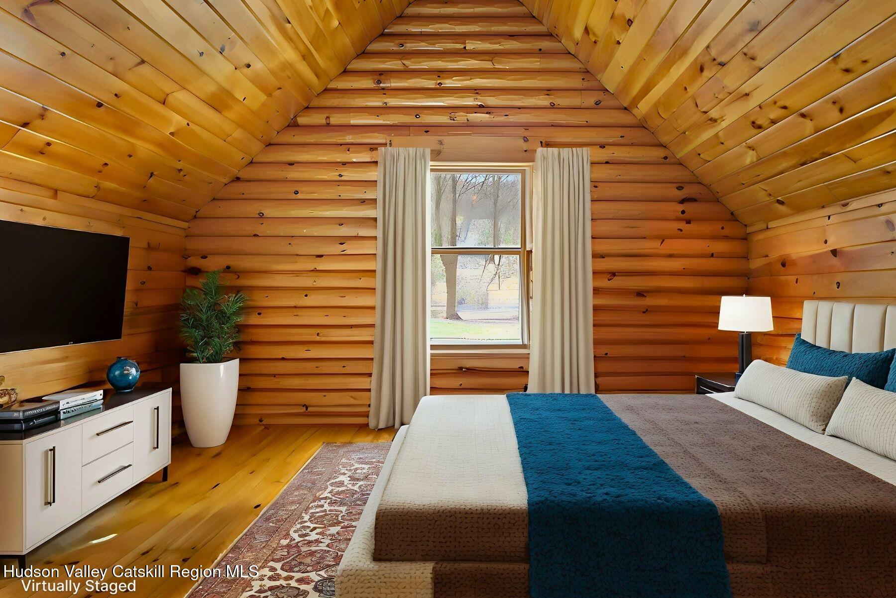 281 Turk Hollow Road Fleischmanns, NY 12430 - Photo 13 of 30 a bedroom with a bed and flat screen tv