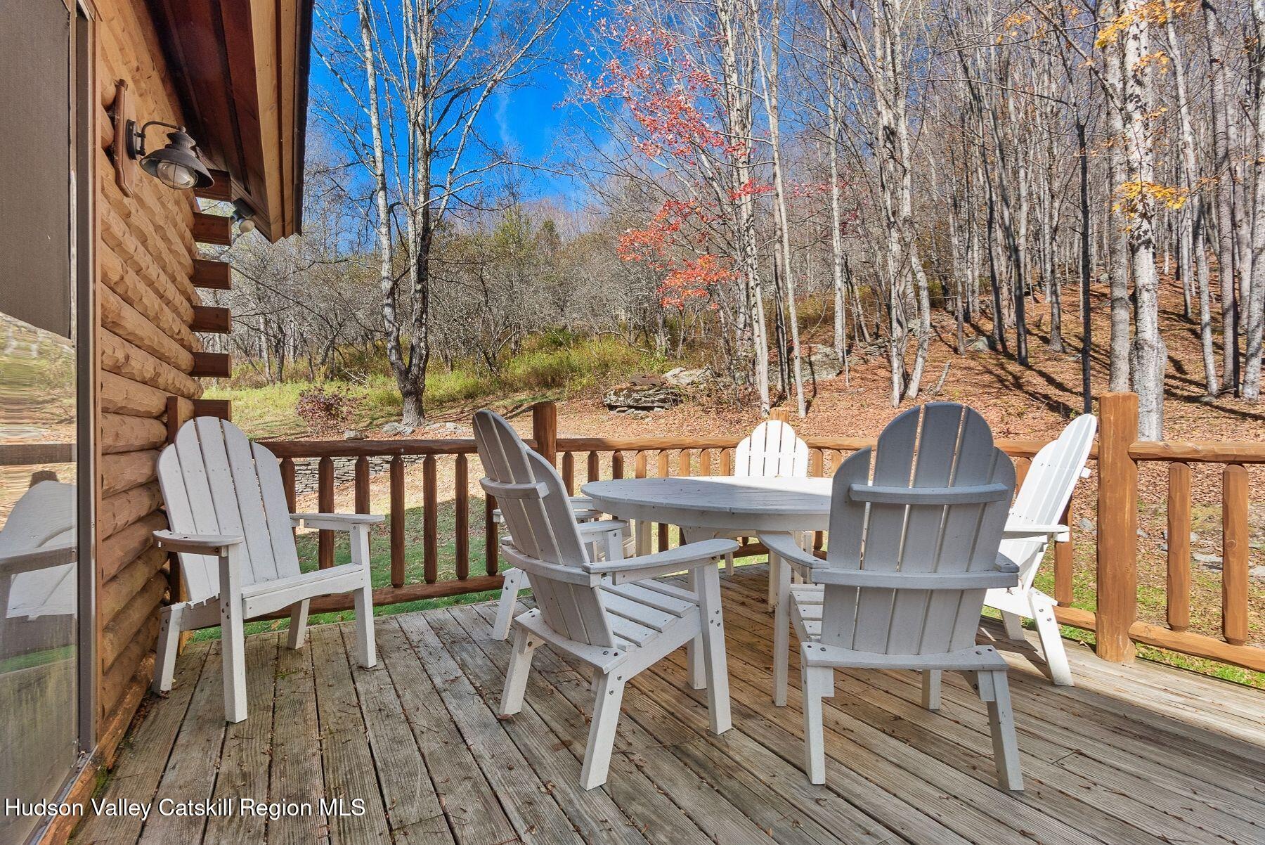 281 Turk Hollow Road Fleischmanns, NY 12430 - Photo 24 of 30 a view of a chairs and table on the deck