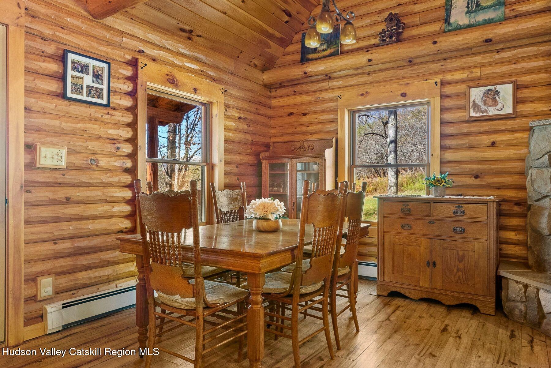 281 Turk Hollow Road Fleischmanns, NY 12430 - Photo 10 of 30 a dining room with furniture and wooden floor