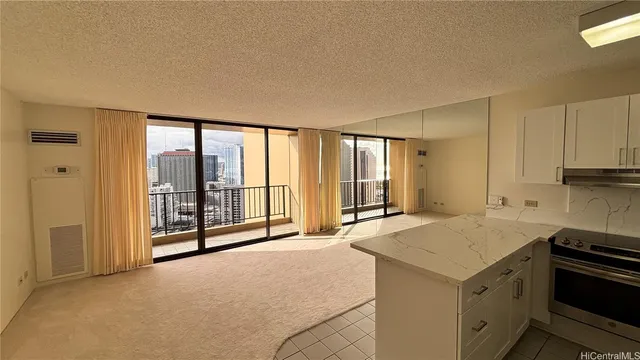a view of a kitchen with a sink and cabinets