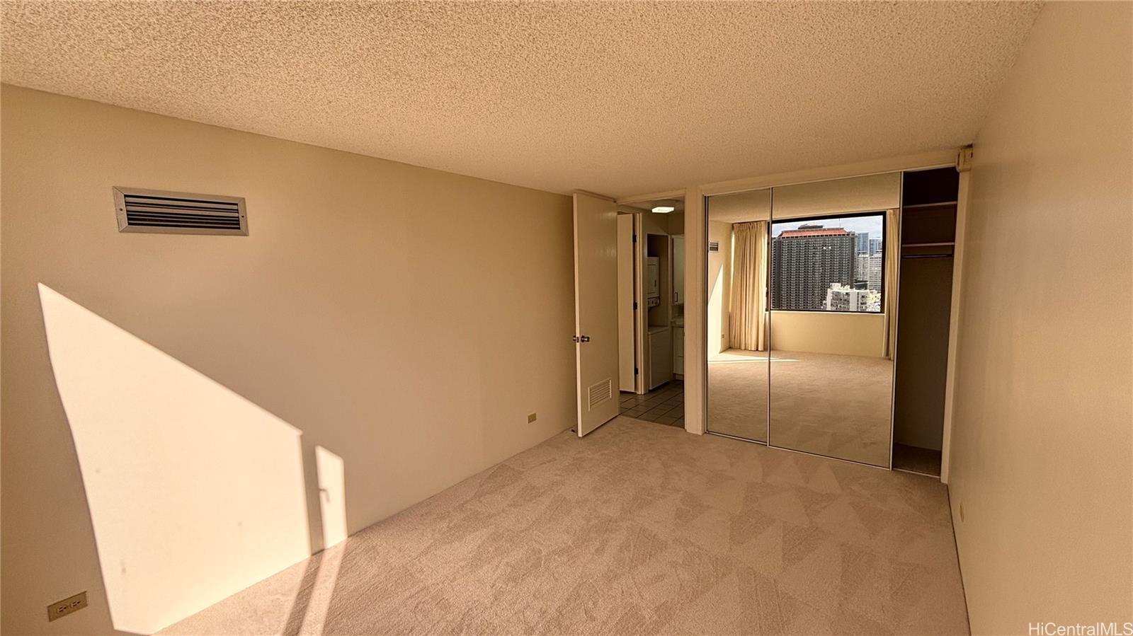 411 Hobron Lane, Unit 3208 Honolulu, HI 96815 - Photo 6 of 9 a view of hallway with wooden floor