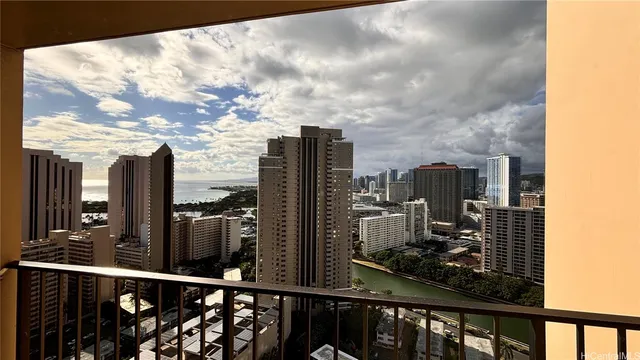 a view of a balcony with city view