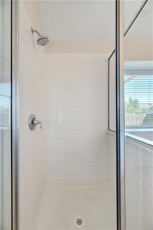 7108 Hester Road Austin, TX 78725 - Photo 9 of 25 a bathroom with a bathtub