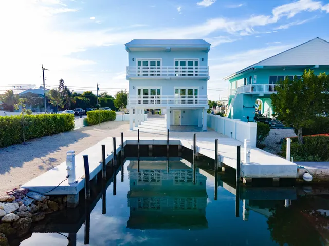 a view of an chairs and tables in the patio