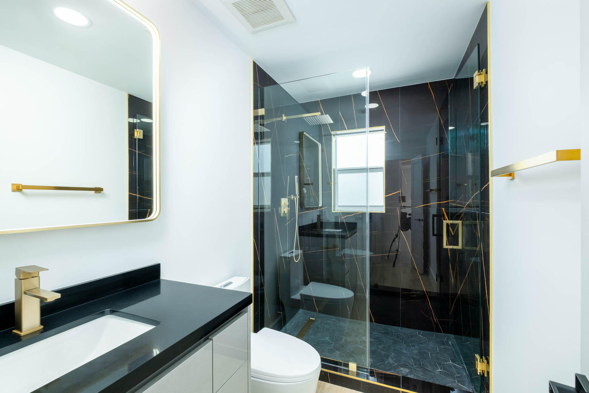 613 Portia Circle Key Largo, FL 33037 - Photo 12 of 40 a bathroom with a sink a toilet and shower