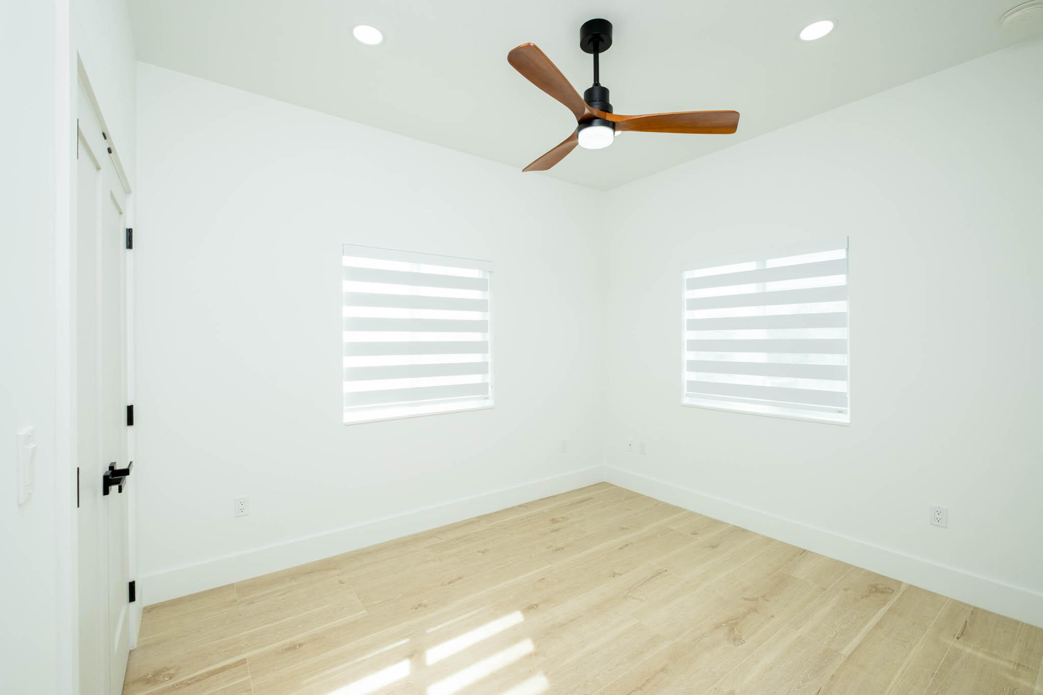 613 Portia Circle Key Largo, FL 33037 - Photo 13 of 40 a view of a room with a ceiling fan and a window