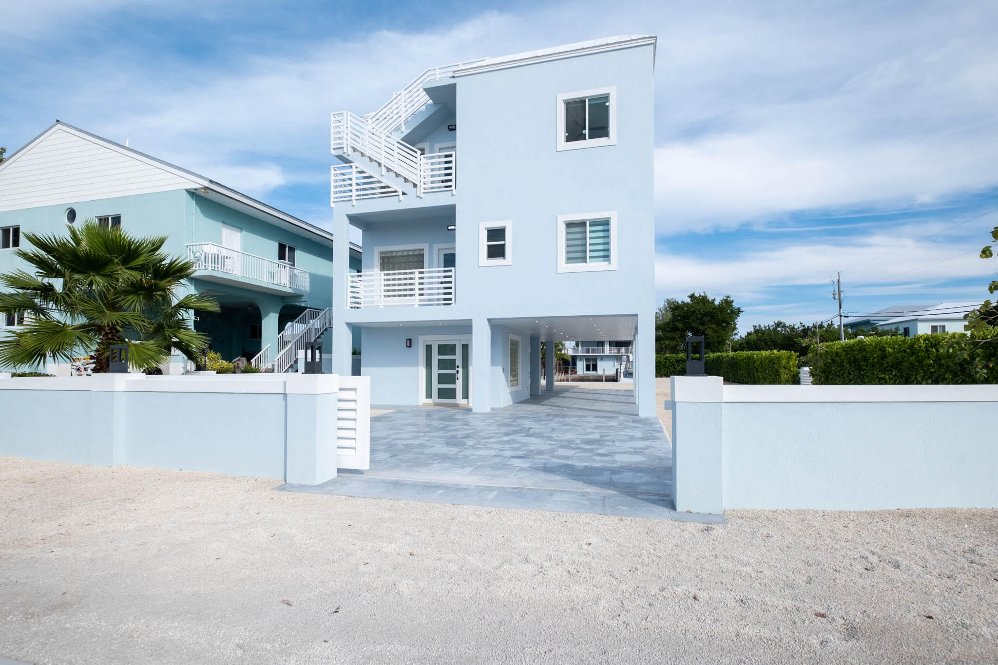613 Portia Circle Key Largo, FL 33037 - Photo 37 of 40 front view of a house with a yard