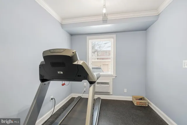 a workspace with furniture and window