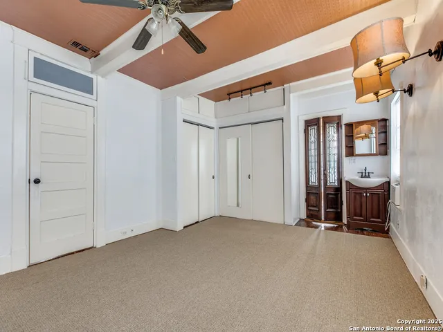 an empty room with windows