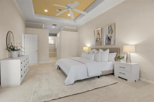 a bathroom with a granite countertop sink a mirror and a shower