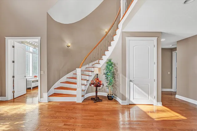 a view of walk in closet with clothes