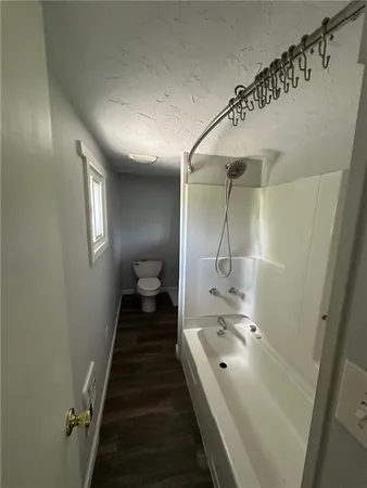 a bathroom with a double vanity sink and mirror