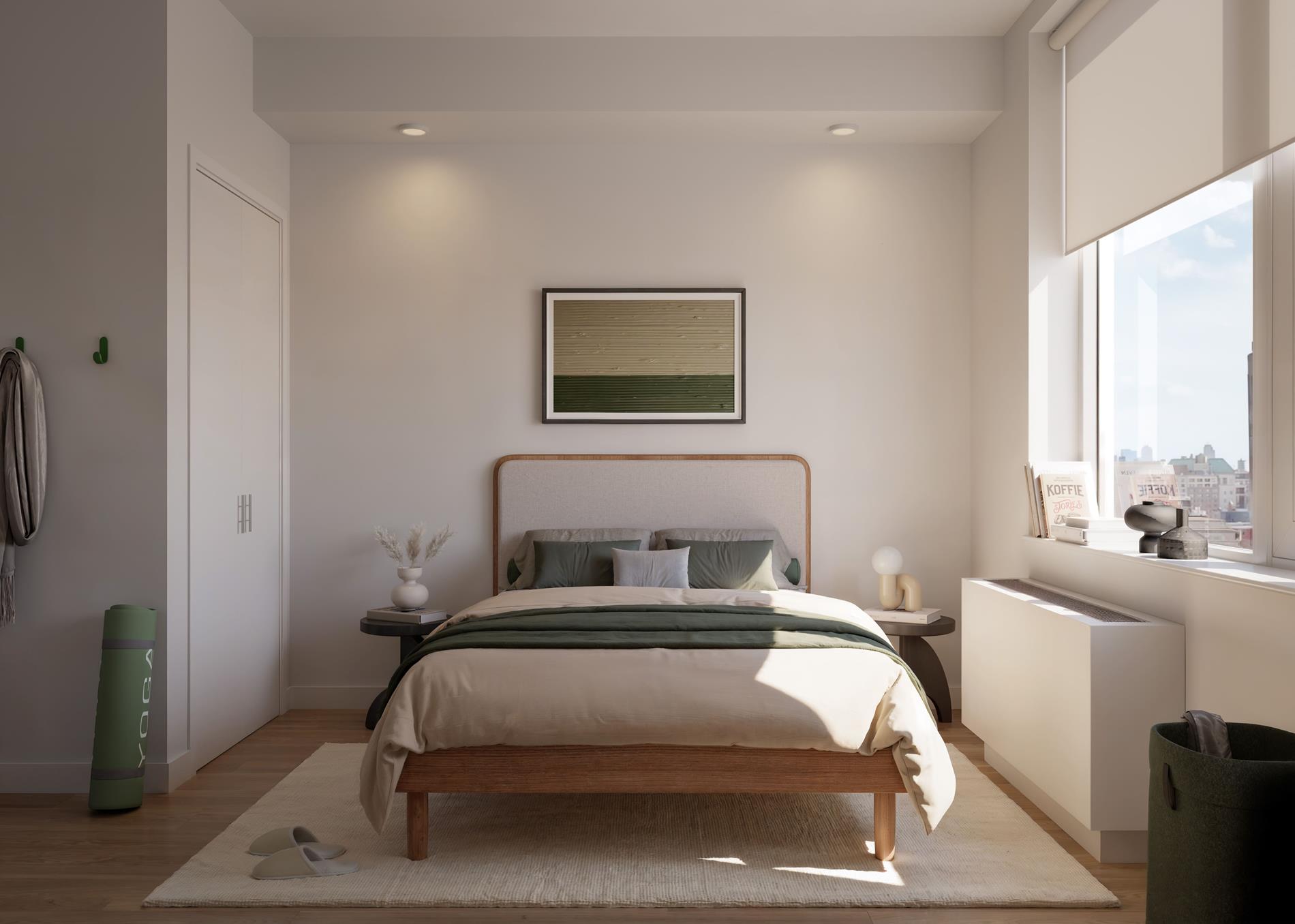 1440 Amsterdam Avenue, Unit 1707 Manhattan, NY 10027 - Photo 5 of 22 a bedroom with a bed and a window