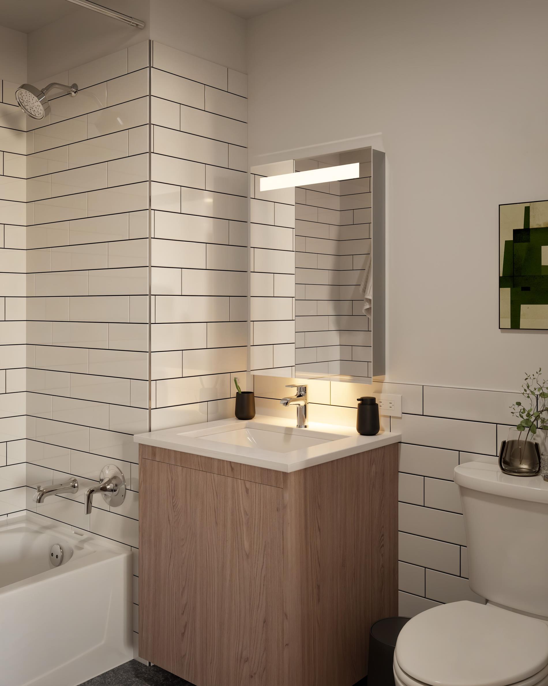 1440 Amsterdam Avenue, Unit 1707 Manhattan, NY 10027 - Photo 6 of 22 a bathroom with a sink toilet and shower